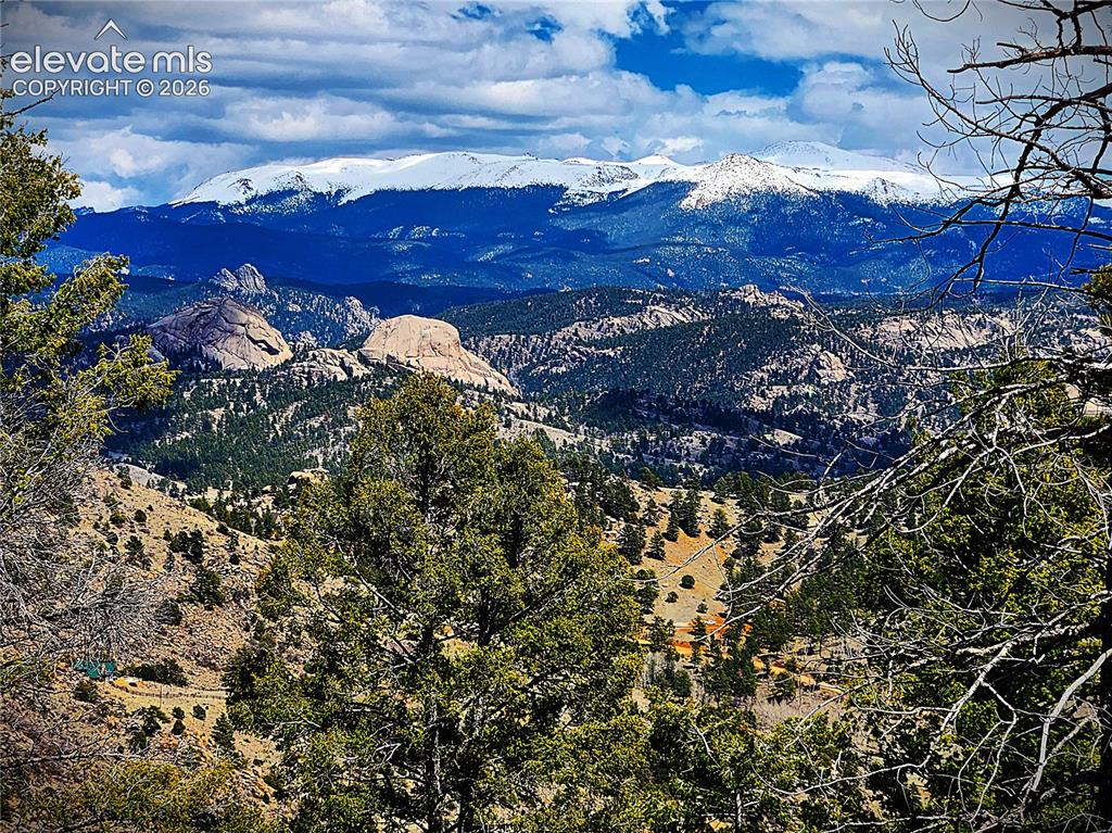 Image 3 of 50: Looking East from Building Site towards Pikes Peak