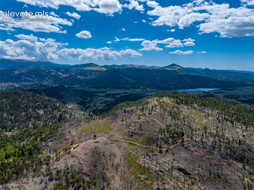 Image 4 of 50: Aerial View from the NW of driveway