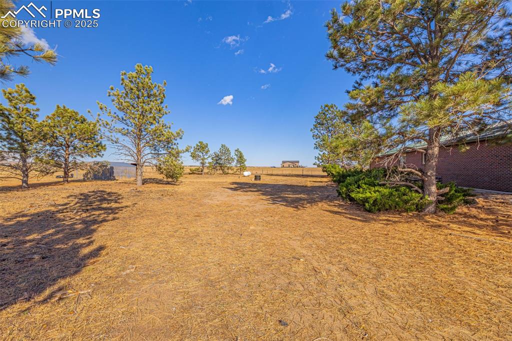 Image 32 of 42: View of yard featuring a view of countryside