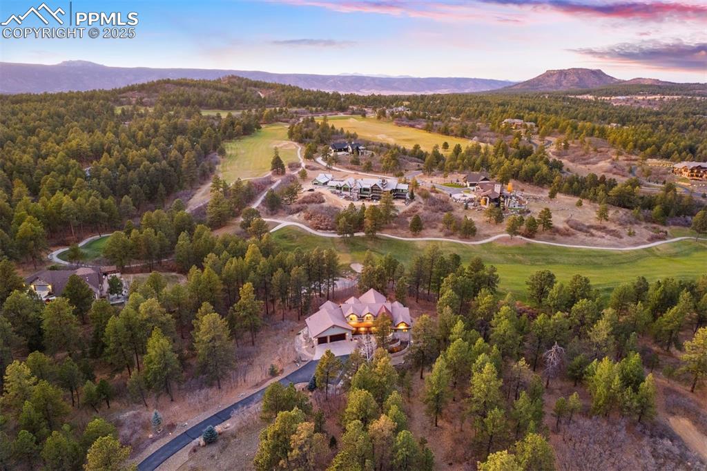 Image 2 of 41: Set in the gated Bear Dance community, this 2.5-acre retreat is right on th