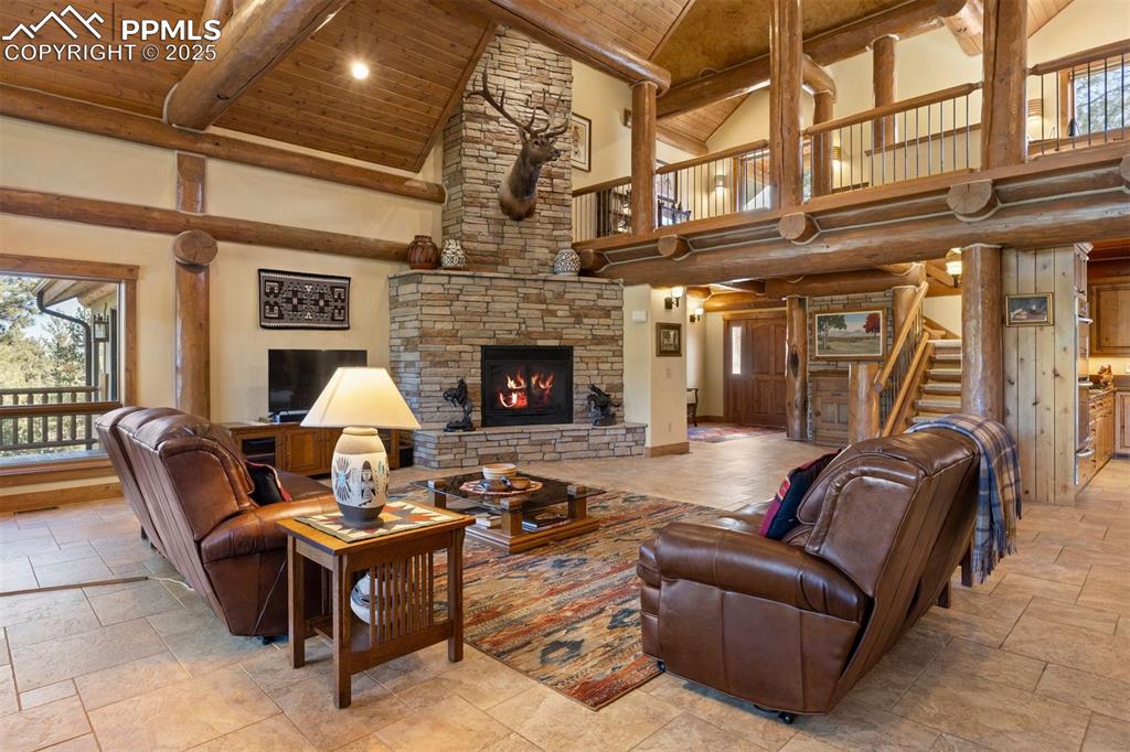 Image 6 of 41: Living spaces balance grand architectural scale with warm, intimate areas f