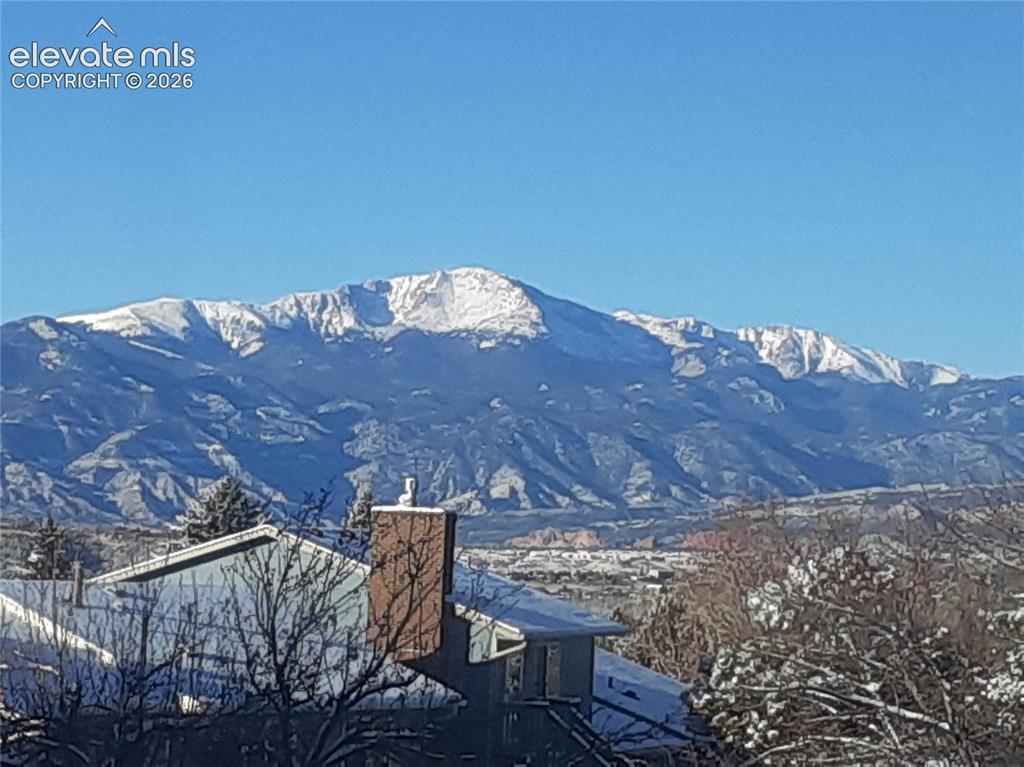 Image 43 of 44: Pikes Peak sunrise view from back deck