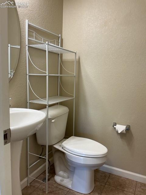 Image 12 of 32: Hall Powder room