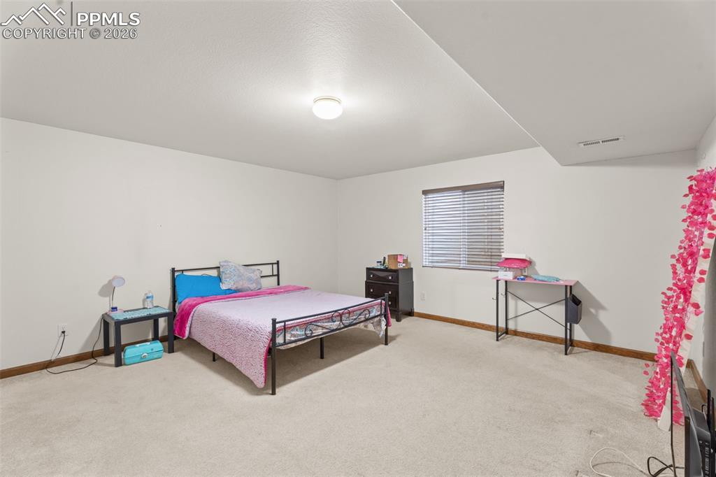 Image 22 of 36: Bedroom