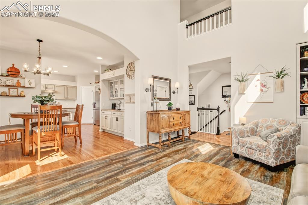 Image 15 of 45: Dining room flowing into the living room