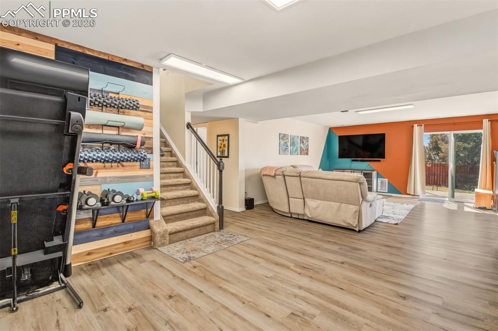 Image 29 of 45: Flex space and recreation room on lower level