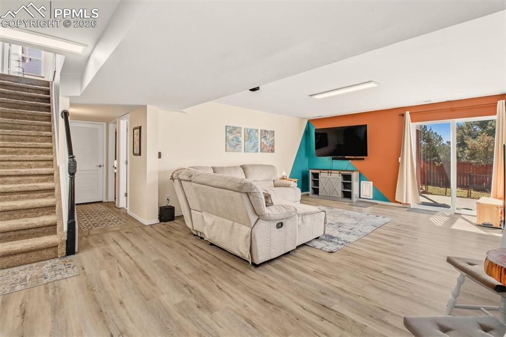 Image 30 of 45: Flex space and recreation room on lower level