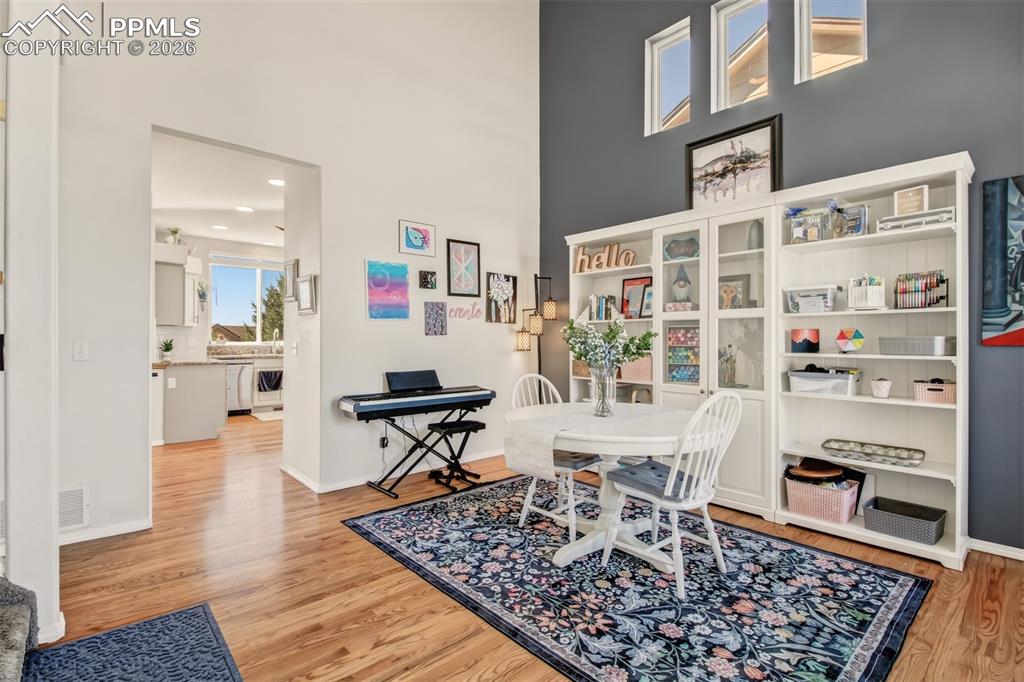Image 5 of 45: Family room with vaulted ceilings and plenty of windows to bring in natural