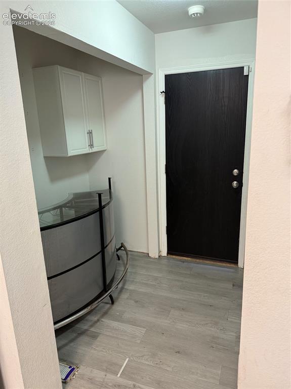 Image 6 of 21: Wood-finish flooring