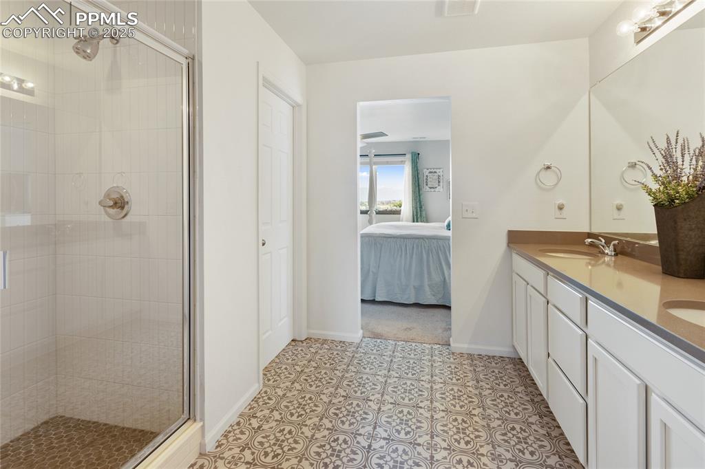 Image 16 of 40: Large Bathroom Off Primary Bedroom Plenty of Room