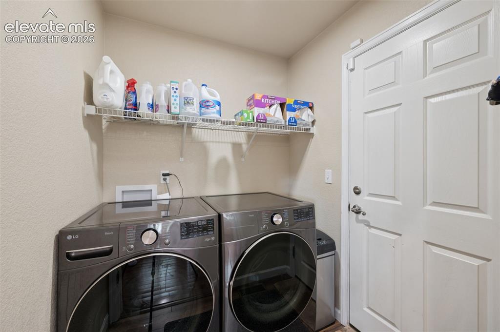 Image 15 of 37: Laundry and garage door