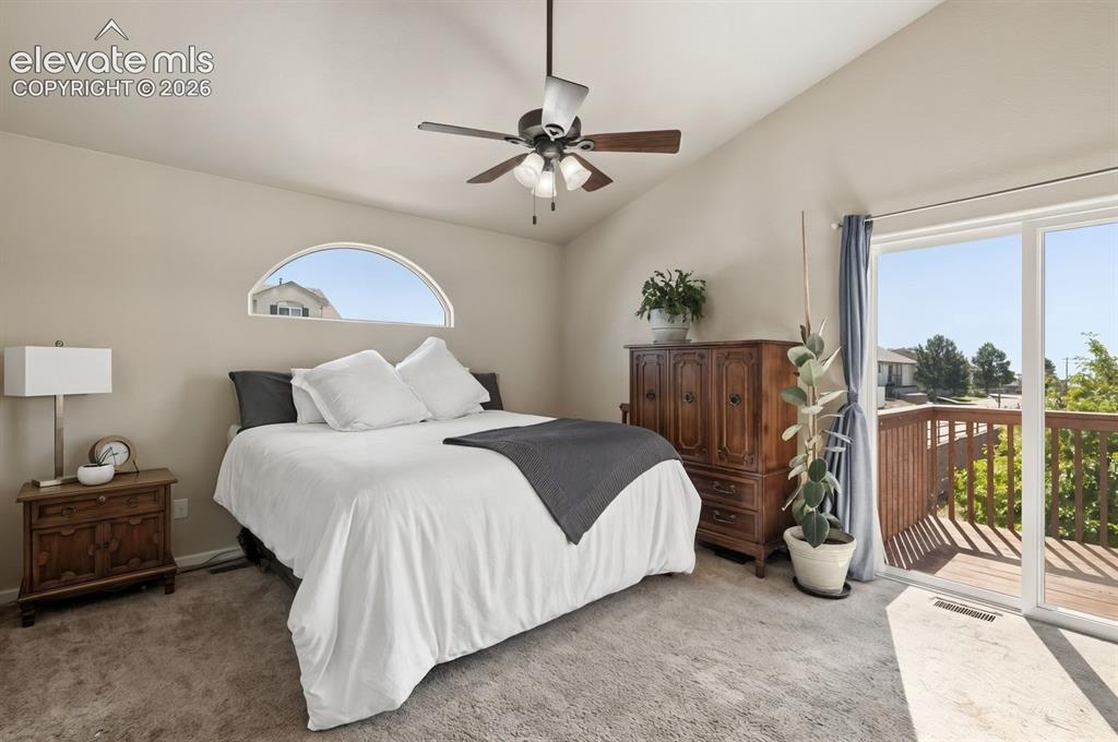 Image 17 of 37: Primary Bedroom with Balcony to open space