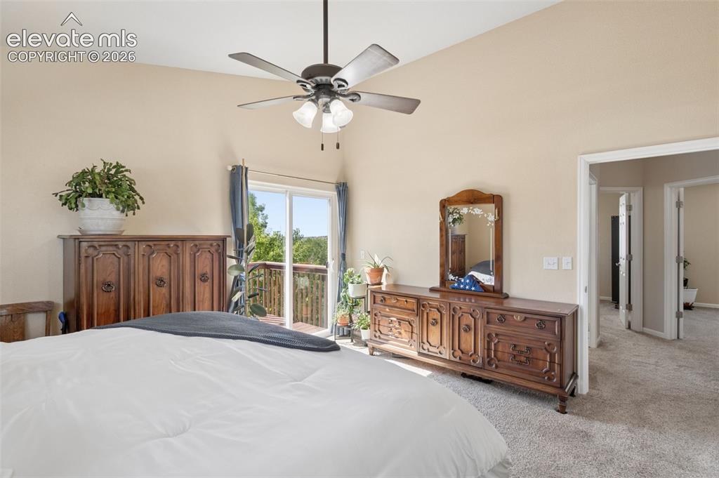 Image 18 of 37: Primary Bedroom with Balcony to open space