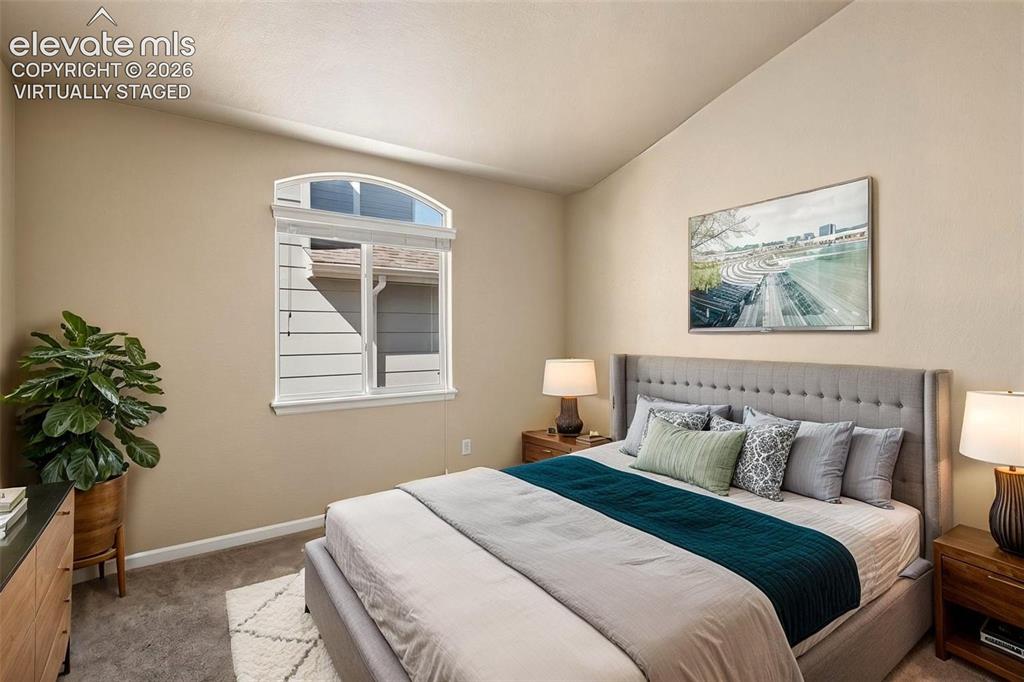 Image 21 of 37: 2nd Bedroom on main level-Virtually Staged