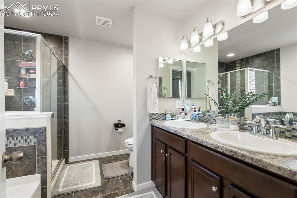 Image 27 of 48: Master Bathroom