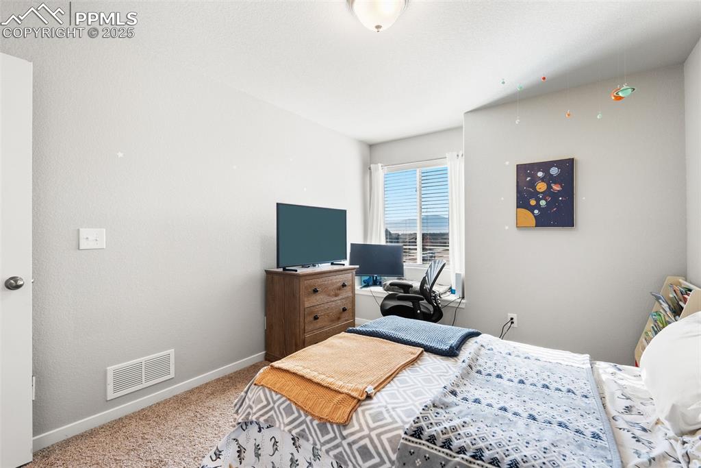 Image 33 of 48: Bedroom