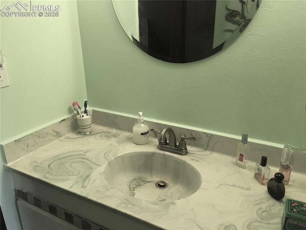 Image 14 of 33: Curl up in front of a warm fire in the lower level family room.