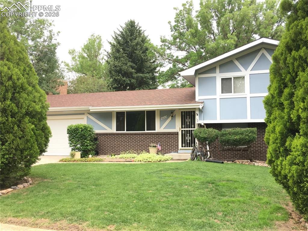 Image 2 of 33: This could be your new home... 3 bedrooms, 1.5 baths & 2-car garage with lo