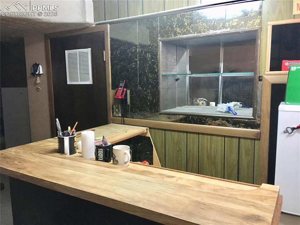 Image 22 of 33: Upper level primary bedroom features a walk-in closet.