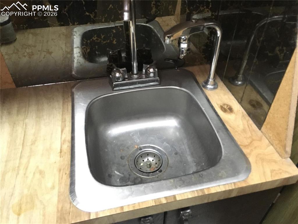 Image 23 of 33: Upper level bedroom 2.