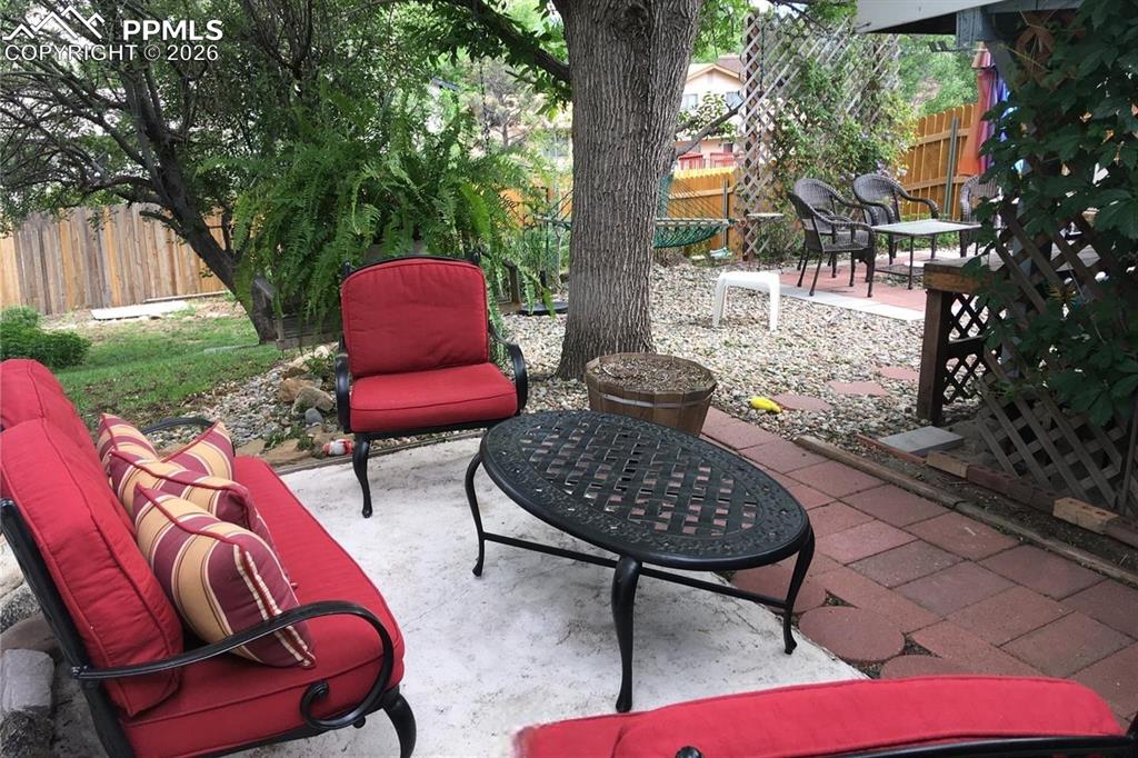 Image 27 of 33: 4th level basement includes a wet bar.