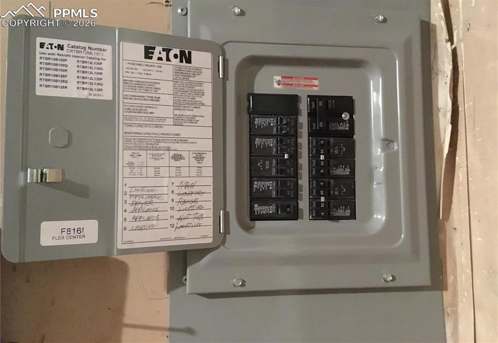 Image 33 of 33: Awesome backyard with mature trees offers space to enjoy outdoor activities