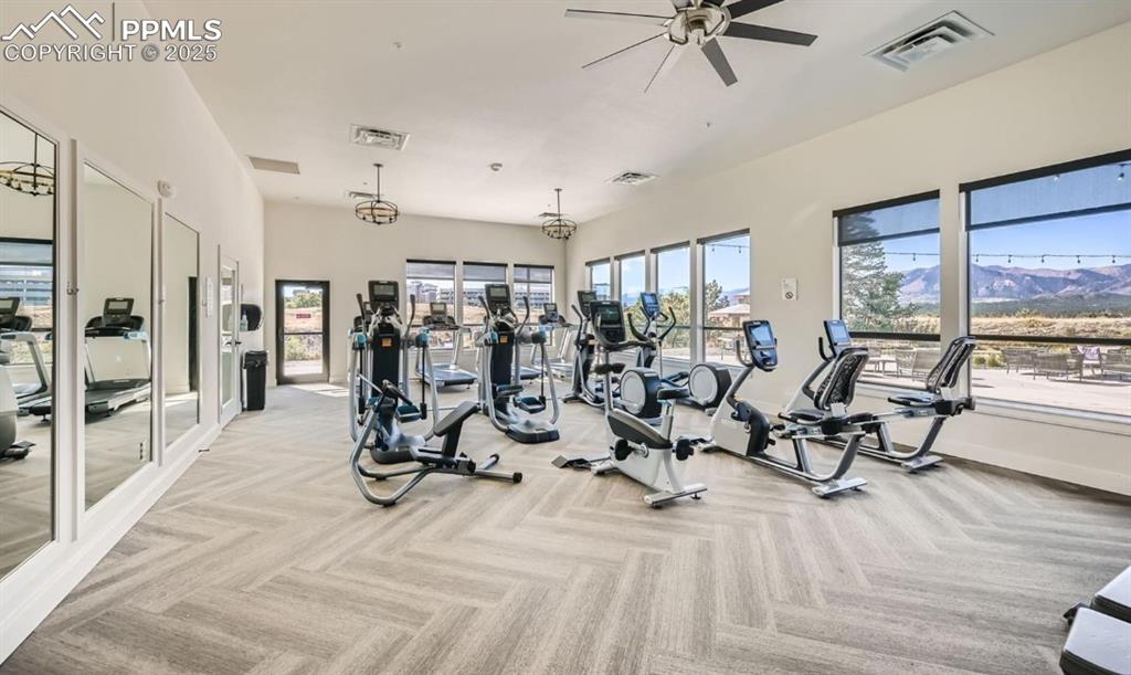 Image 48 of 50: The community has many ammenities, one of which is the private gym and pool