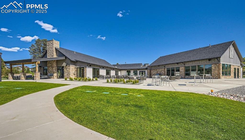 Image 49 of 50: Enjoy events and amenities at the private community center just down the ro