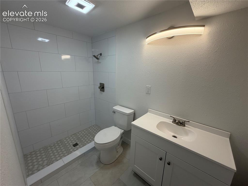 Image 25 of 27: New Tiled Showers