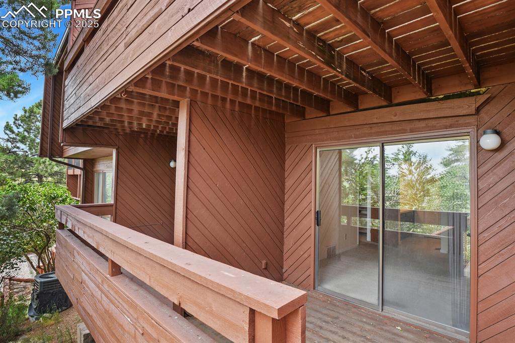 Image 29 of 35: Lower deck accessible from both bedrooms and bonus space