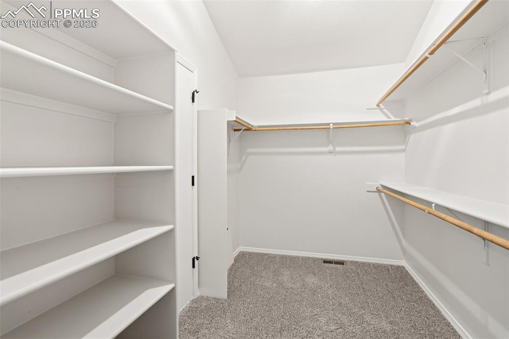 Image 27 of 46: Large Walk-In Closet