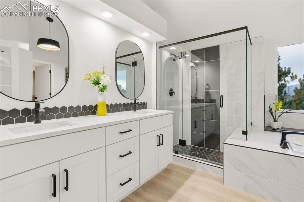 Image 29 of 46: Massive Vanity with Room to Spread Out, and Wind Down in the Steam Shower