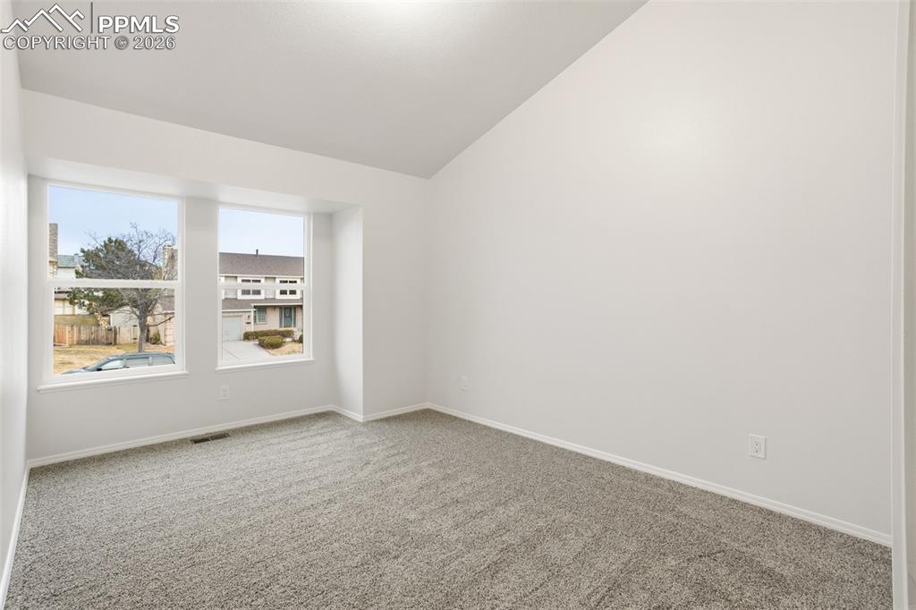 Image 33 of 46: Large Upper-Level Bedroom #3 with Abundant Natural Light