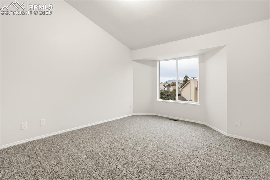 Image 35 of 46: Bedroom #5 Offers Mountain Views and Lots of Extra Space