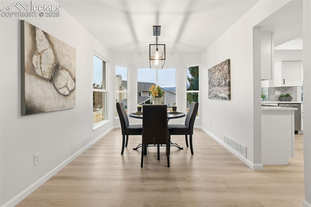 Image 8 of 46: Sunlit Dining Area