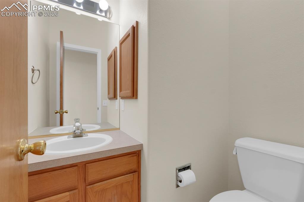 Image 12 of 41: Bathroom featuring toilet and vanity