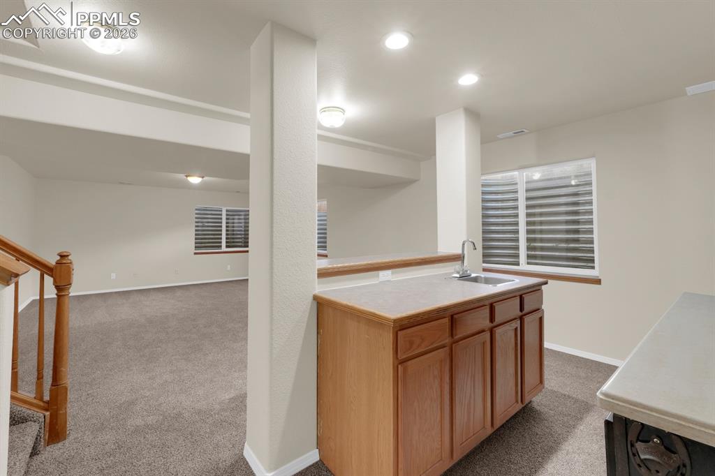 Image 26 of 41: Basement wet bar