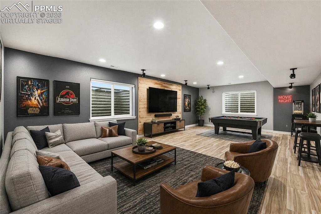 Image 27 of 40: Virtually Staged Home Theatre in basement 