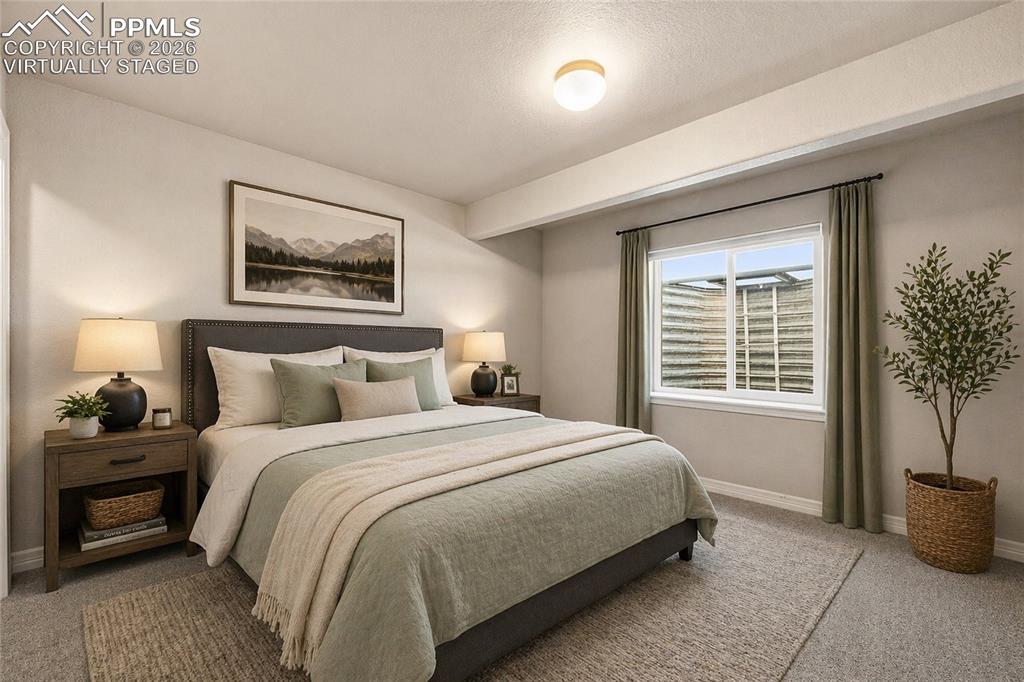 Image 30 of 40: Virtually Staged Basement Bedroom 1 
