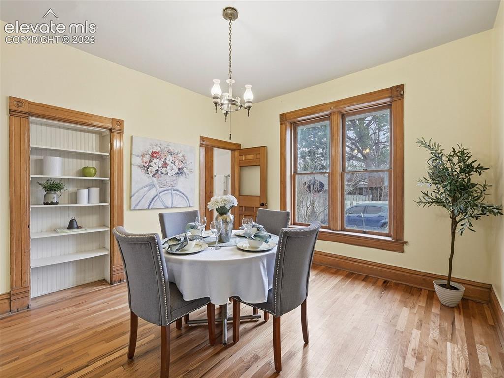 Image 11 of 33: Dining room with built-in