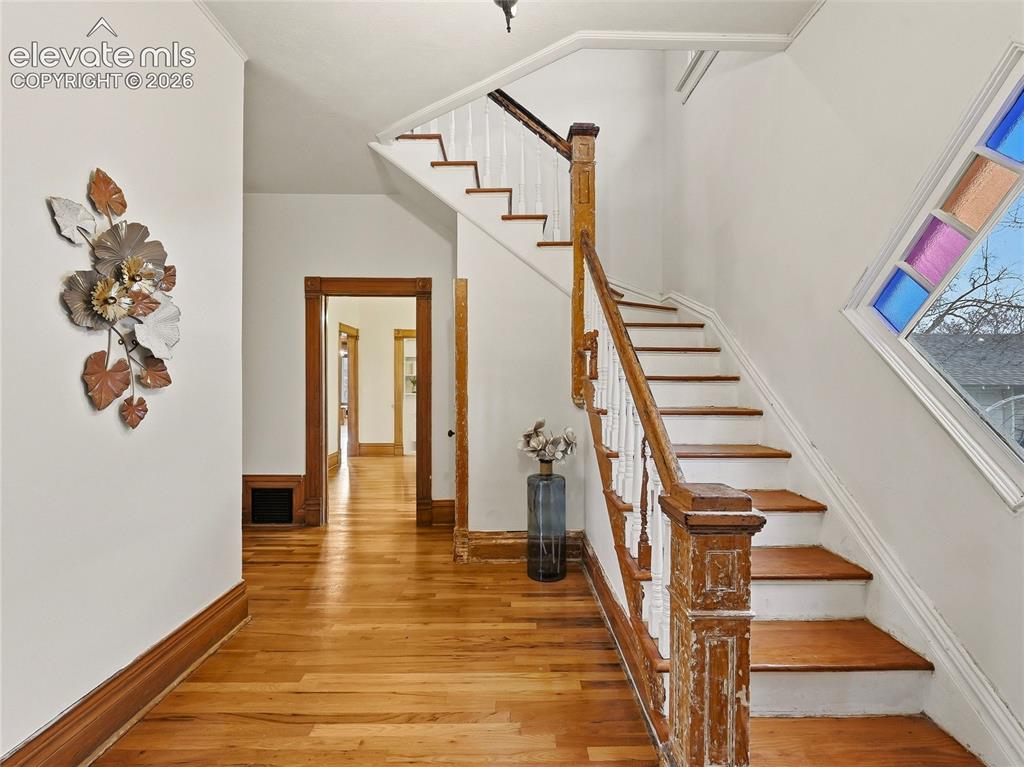 Image 8 of 33: Original hardwood flooring throughout.