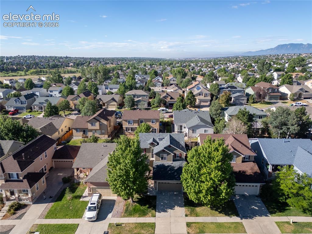 Image 6 of 39: Residential neighborhood with a varied collection of two-story homes featur