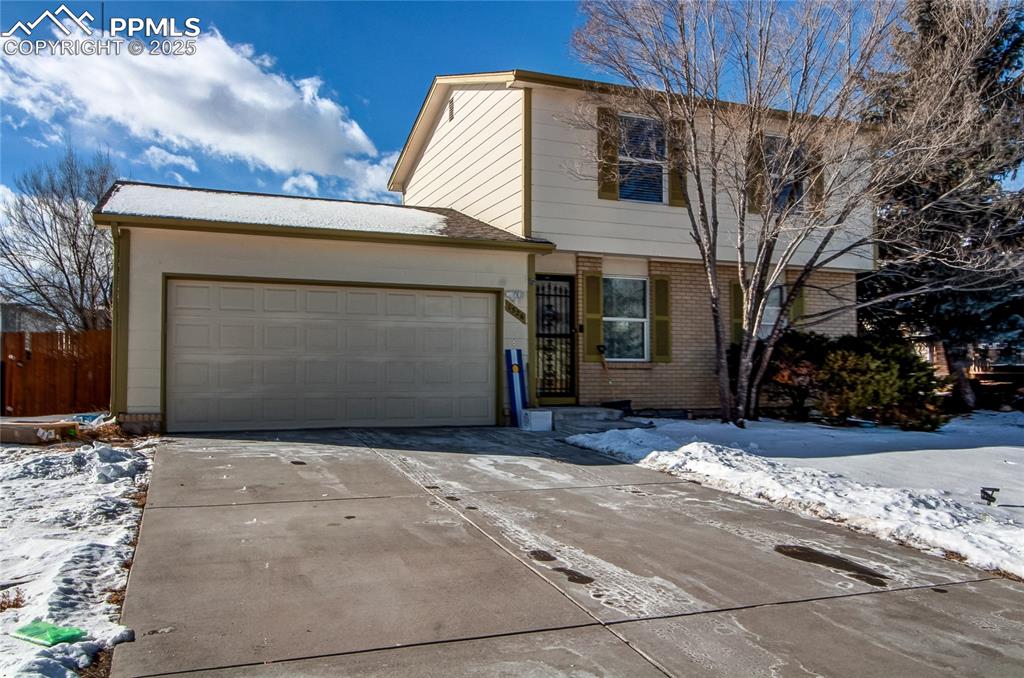 Caption: Front facade with a garage