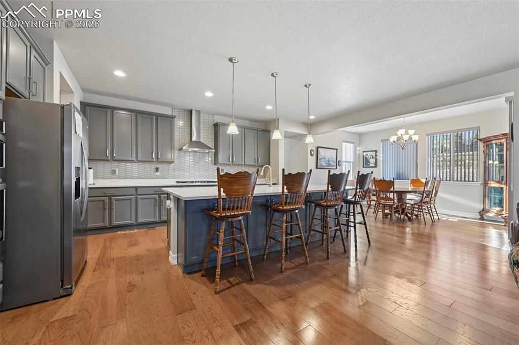 Image 16 of 48: Gourmet kitchen overlooking dining nook