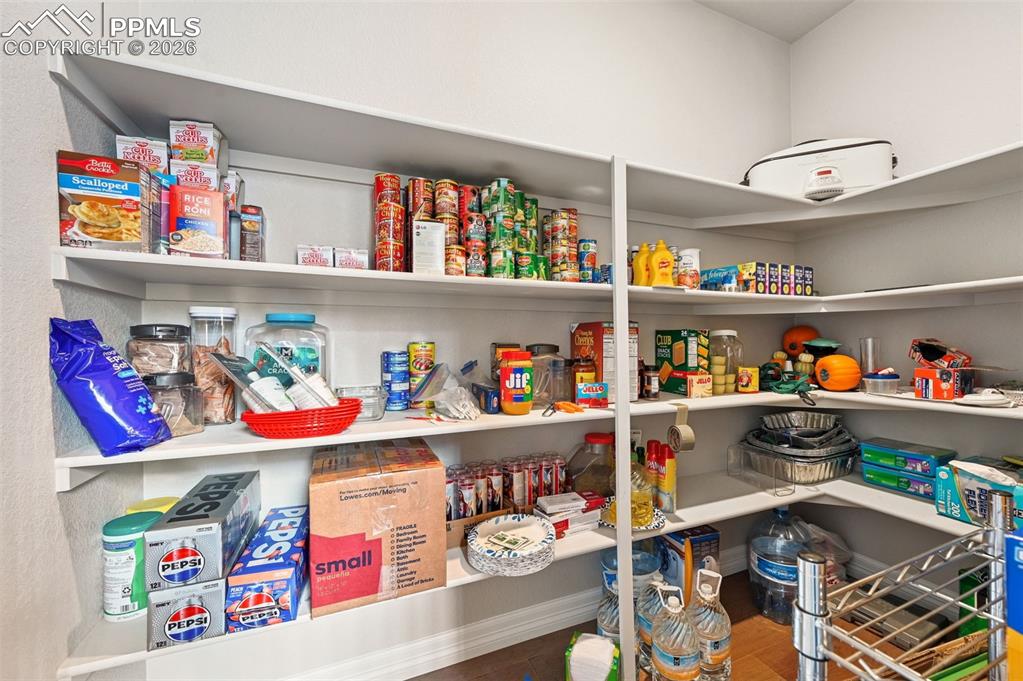 Image 20 of 48: Huge walk in pantry