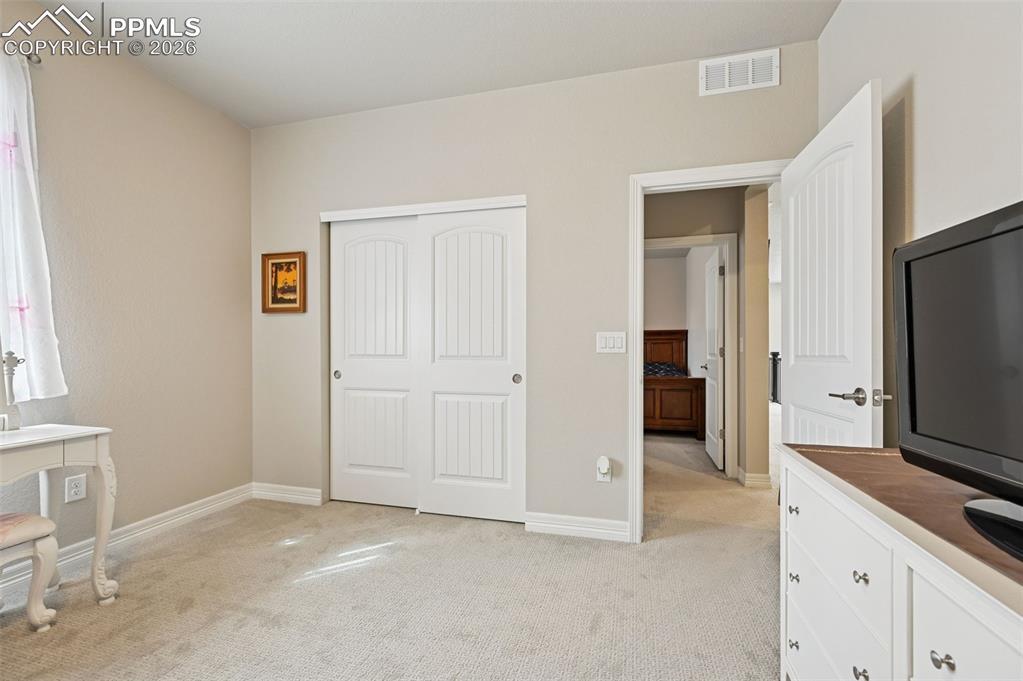 Image 34 of 48: Second bedroom