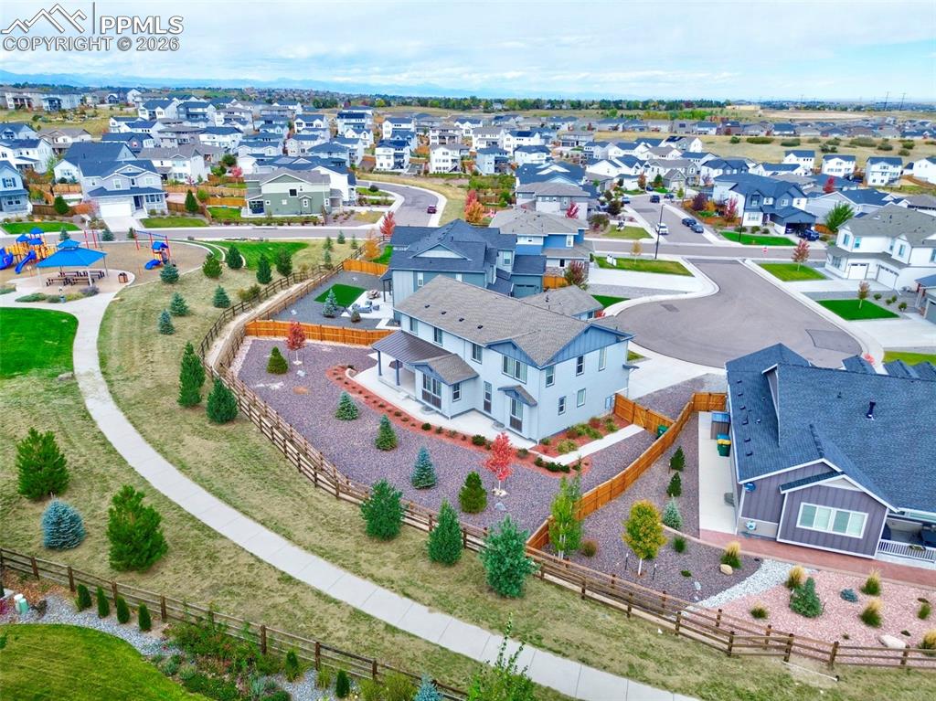 Image 4 of 48: Aerial view of cul de space with green space and playground behind!