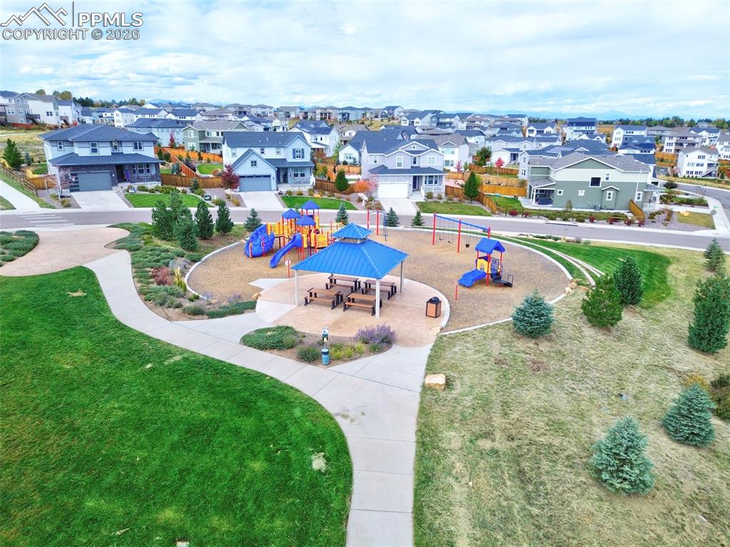 Image 5 of 48: Aerial view of cul de space with green space and playground behind!