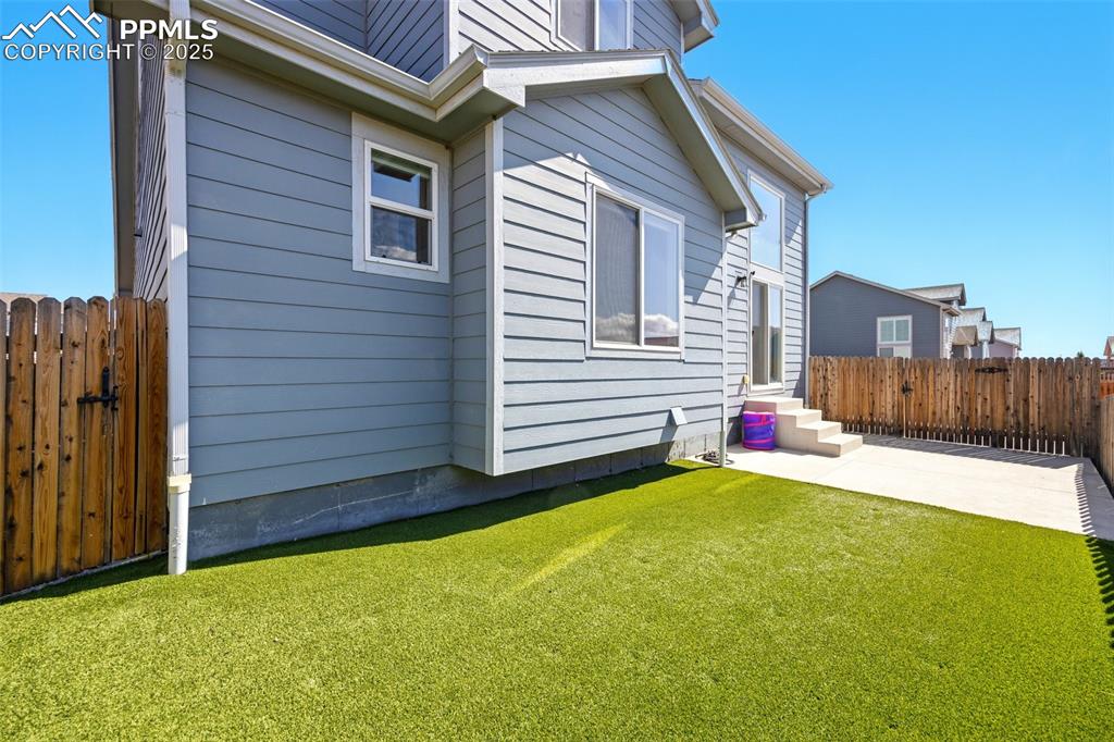 Image 30 of 46: View of side of home