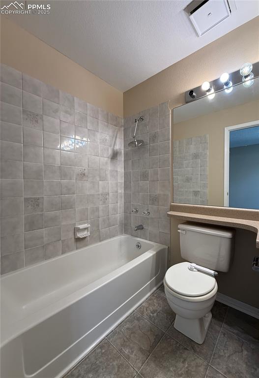 Image 12 of 23: Full bathroom attached to the primary bedroom.